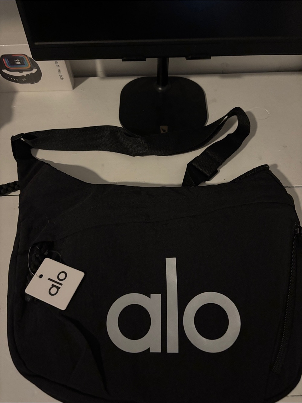 ALO Yoga Black Crossbody Bag with White Logo